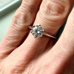 1.0 ct D round Moissanite in size 5 .925 band